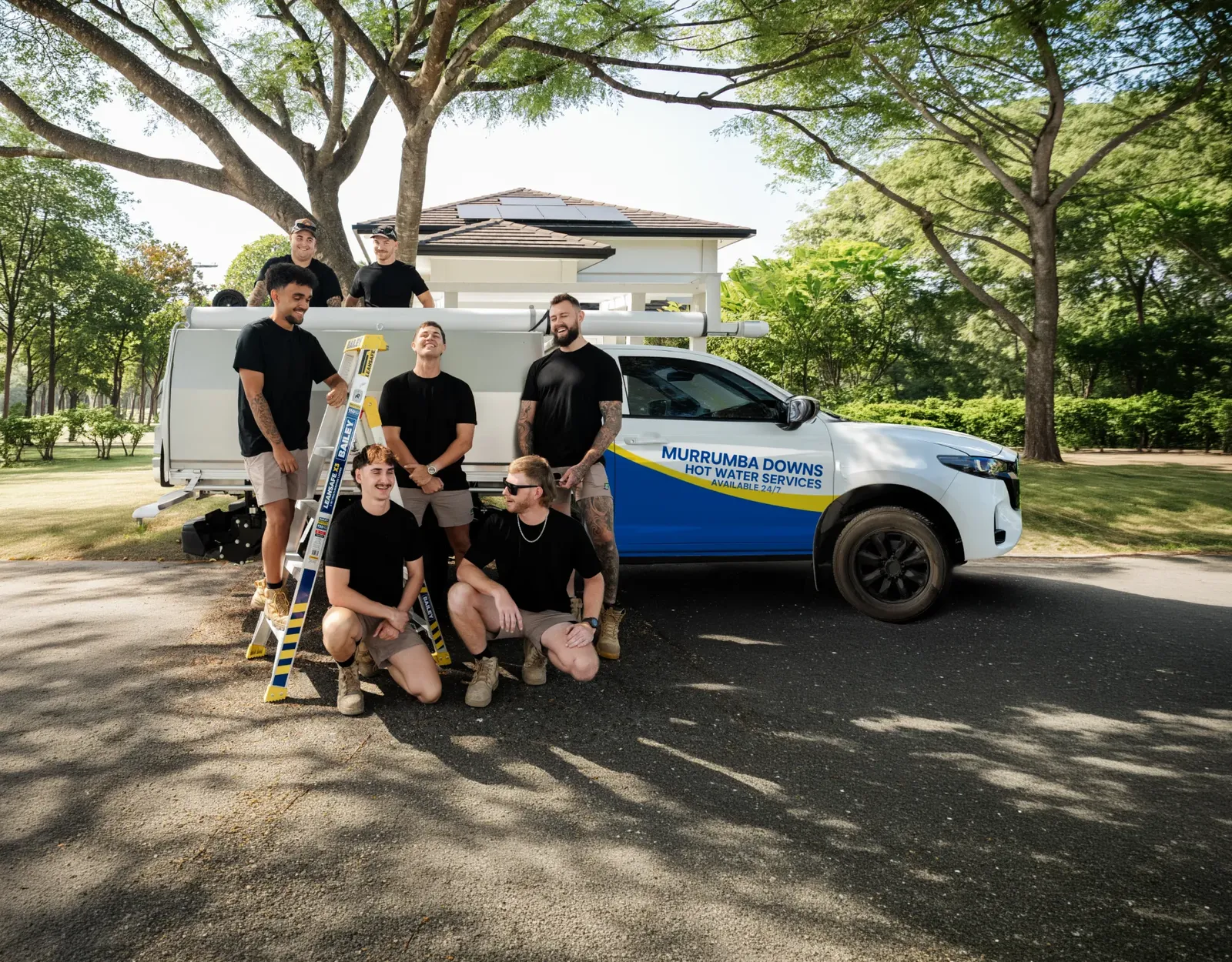 Murrumba Downs Hot Water Services team and ute